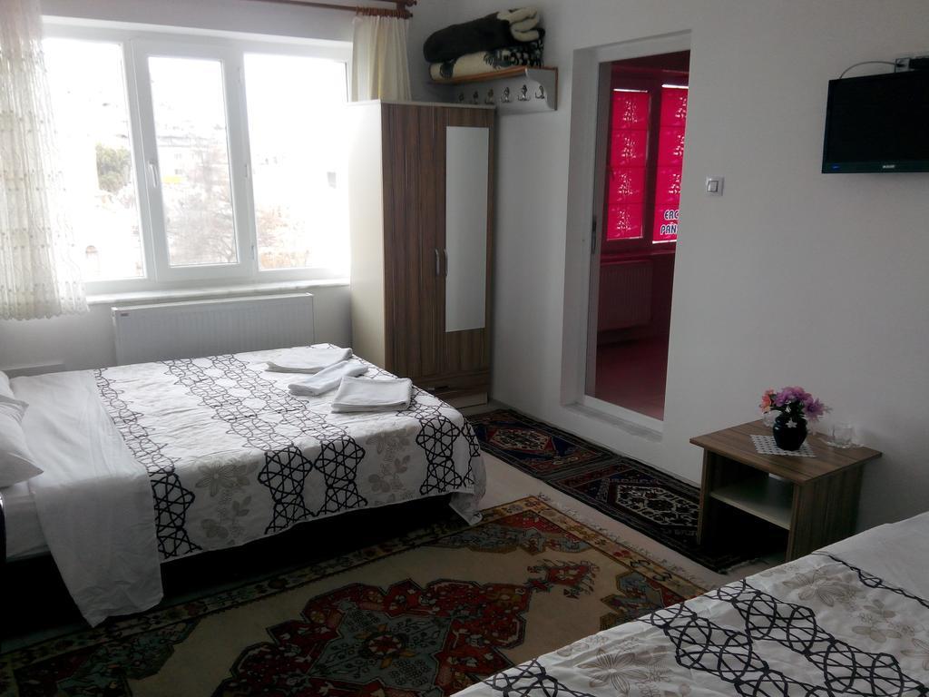 Erciyes Stone Hotel Üchisar Bagian luar foto