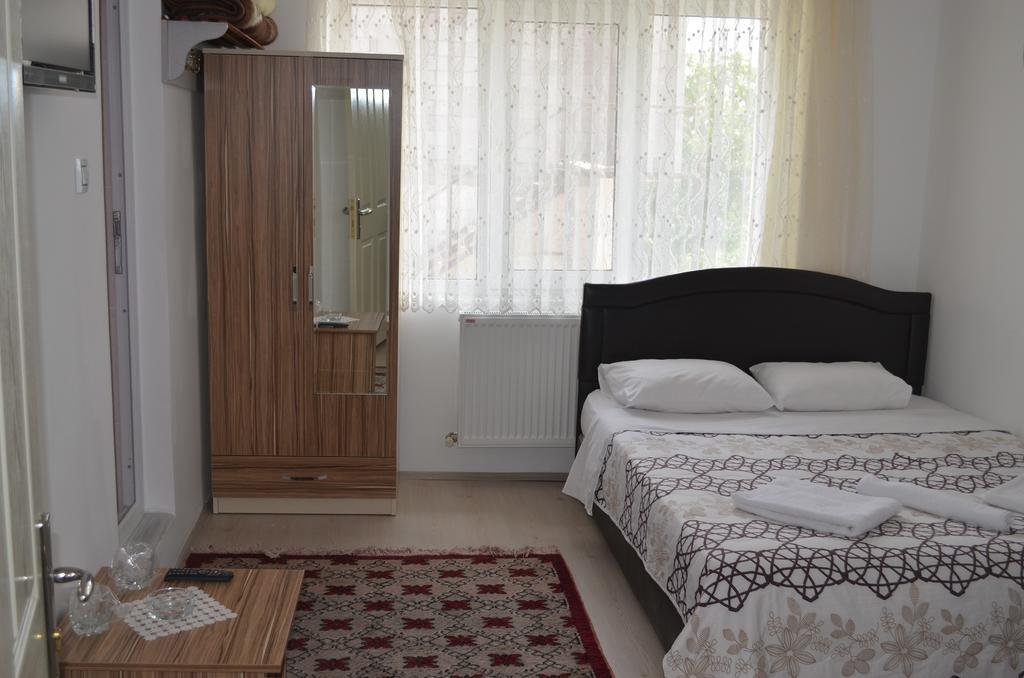 Erciyes Stone Hotel Üchisar Bagian luar foto