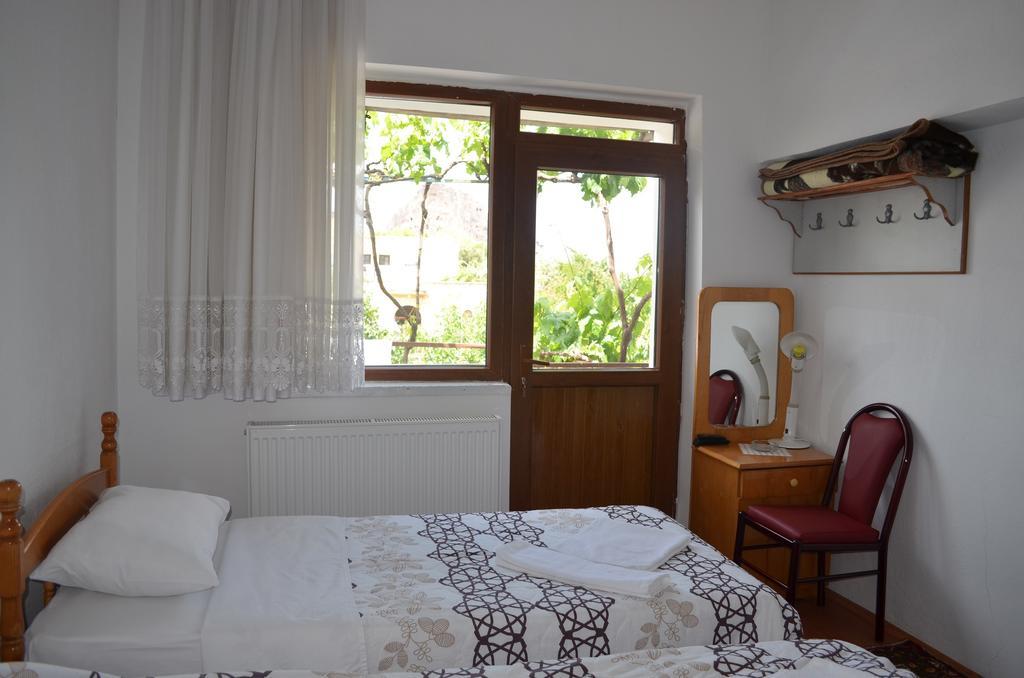 Erciyes Stone Hotel Üchisar Bagian luar foto